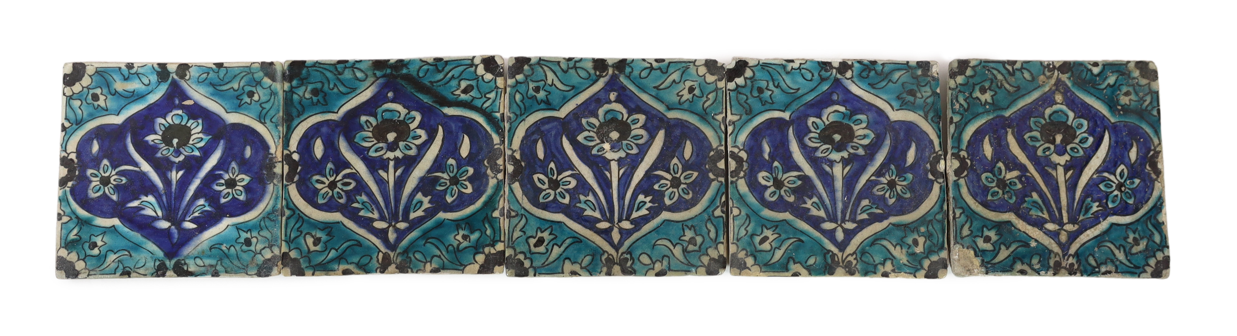 A set of five Persian fritware tiles, Qajar dynasty, 19th century